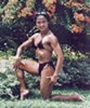 PFBB Miss Philippines Bodybuilding / IFBB Miss Asia Bodybuilding medalist on her Best Pose showing her muscles on calf, arms, abdominal, shoulder, chest, and her pretty face, all in one pose.  Won Best Poser.